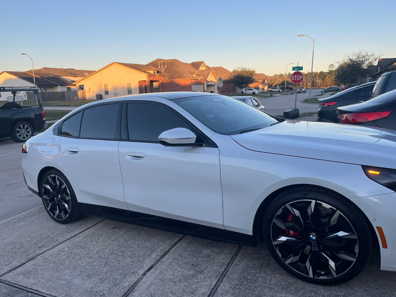 White BMW with tinted windows