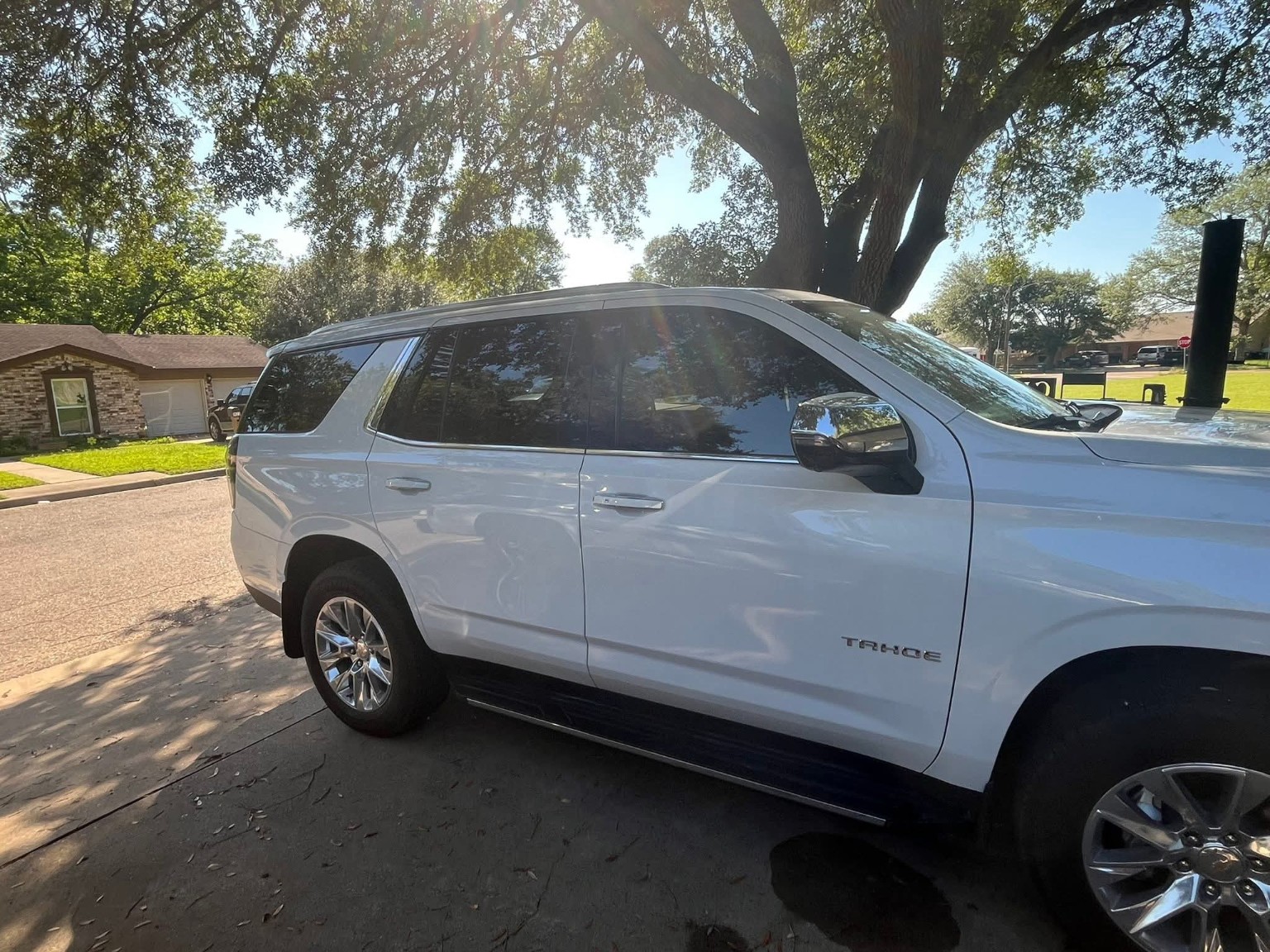 White Tahoe with tinted windows